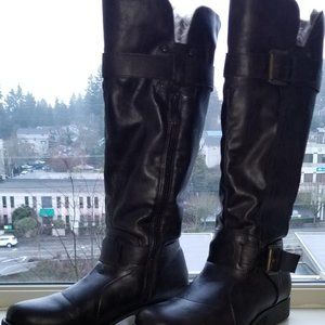 brown boots, man made materials. knee high, faux fur lined, waterproofed.